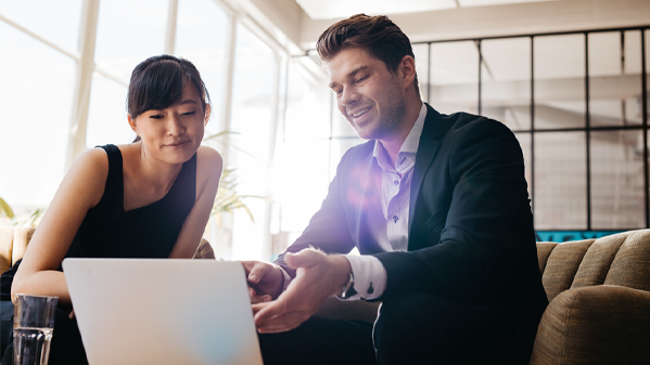 two happy workers in a meeting